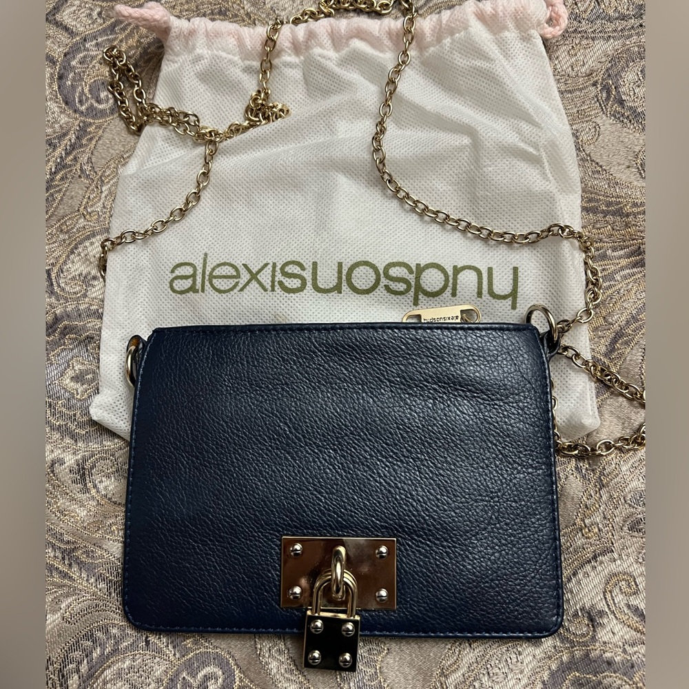 Alexis Hudson dark blue leather purse in excellent condition with dust bag